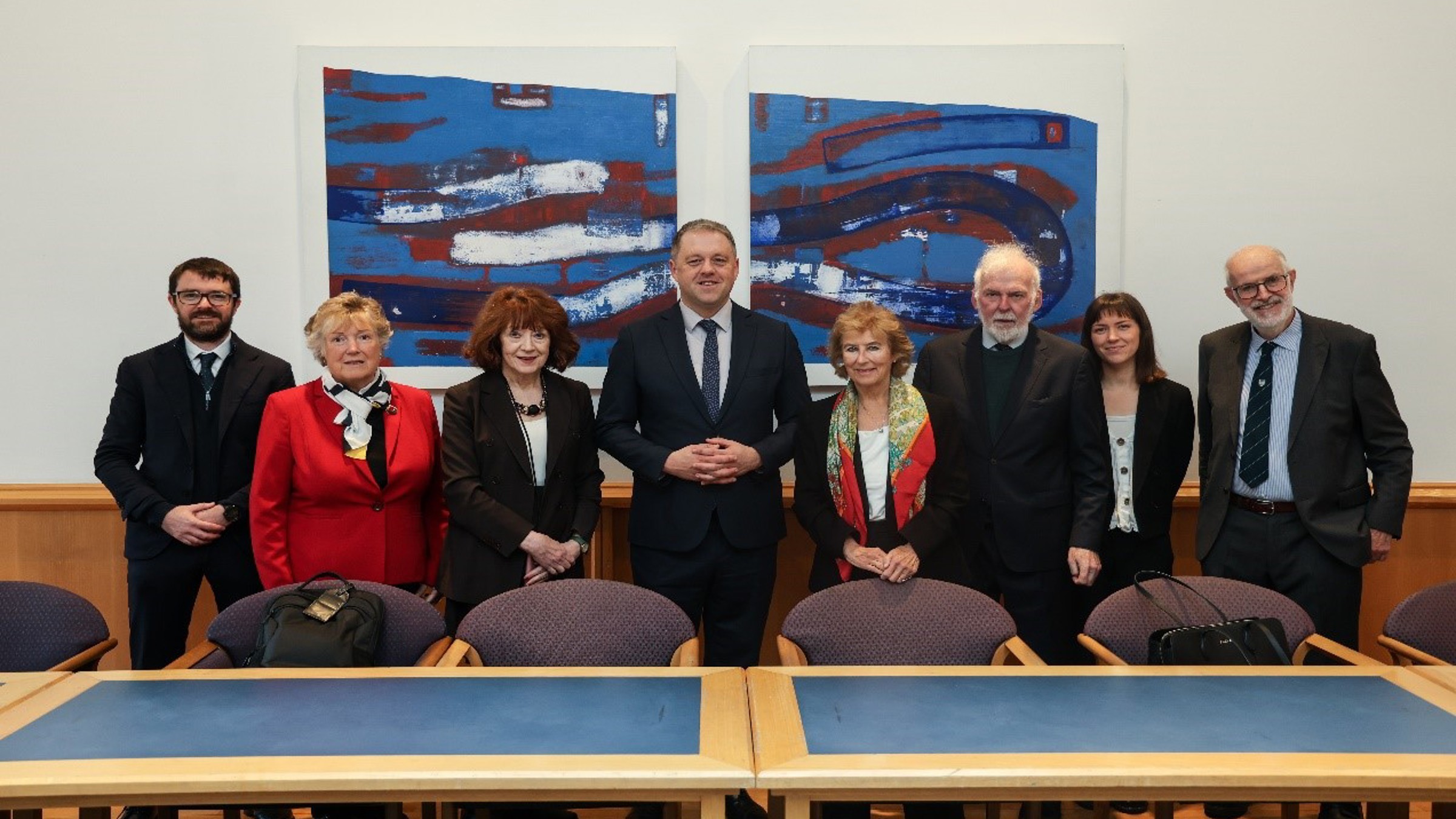 Minister Byrne poses for a photograph with officials from the the Institute of International and European Affairs.