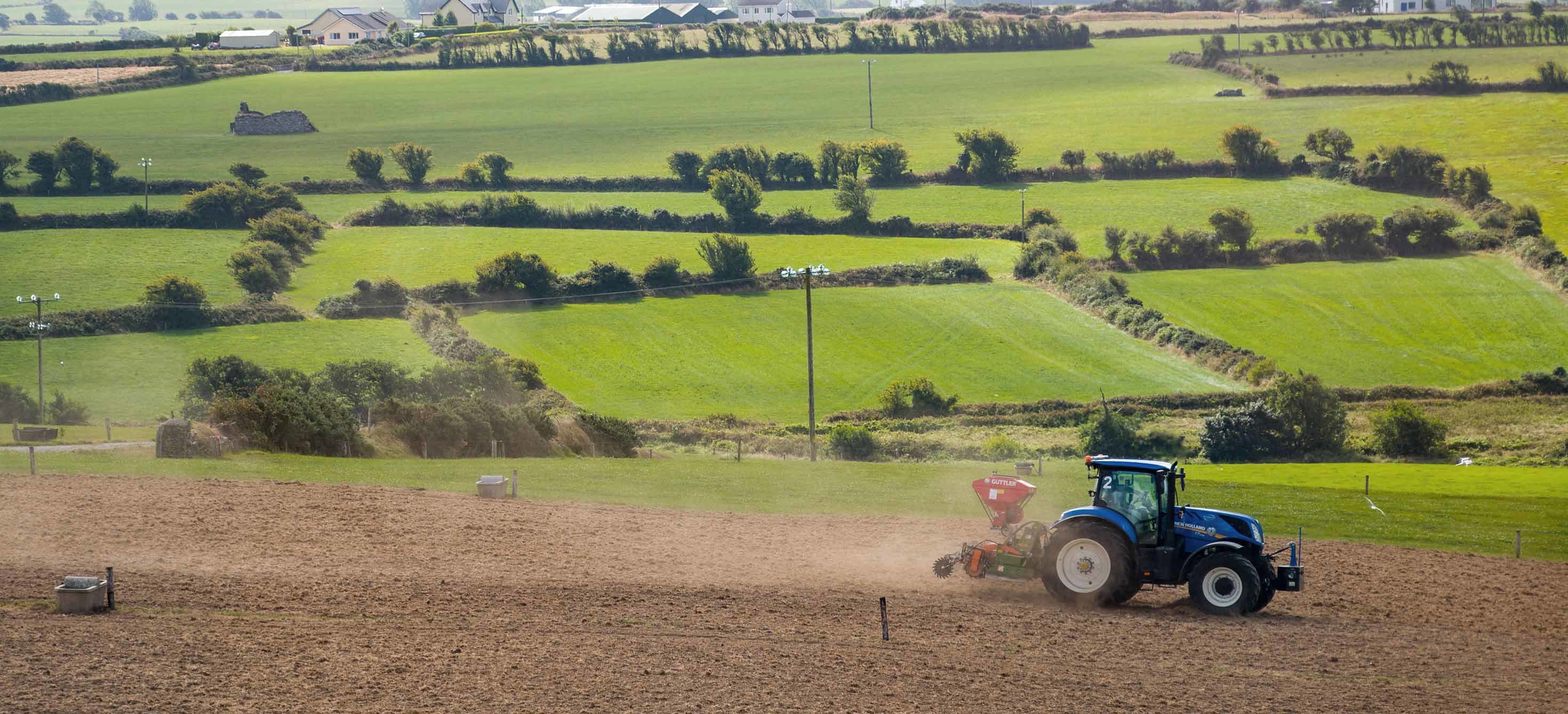 Tractor going over the fields.