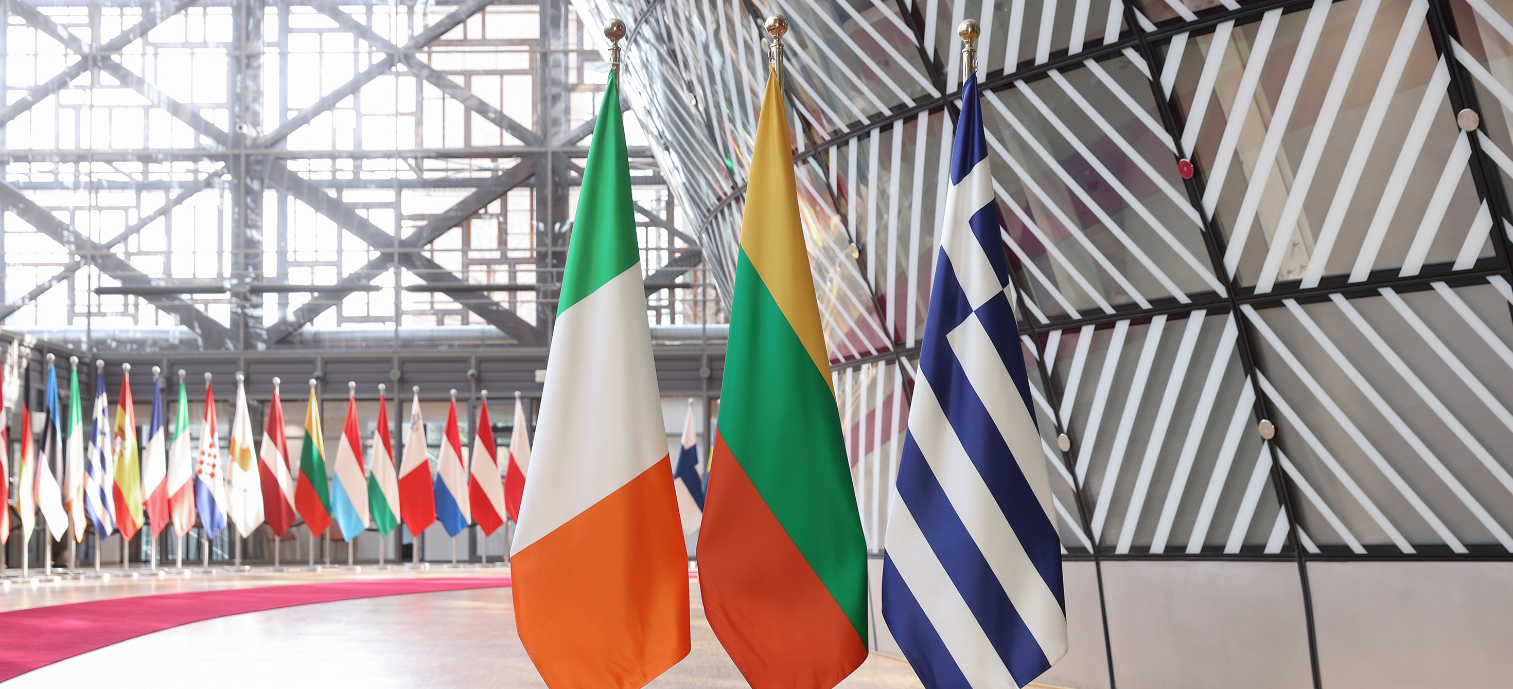 The national flag of Ireland next to the Lithuanian and Greek flags