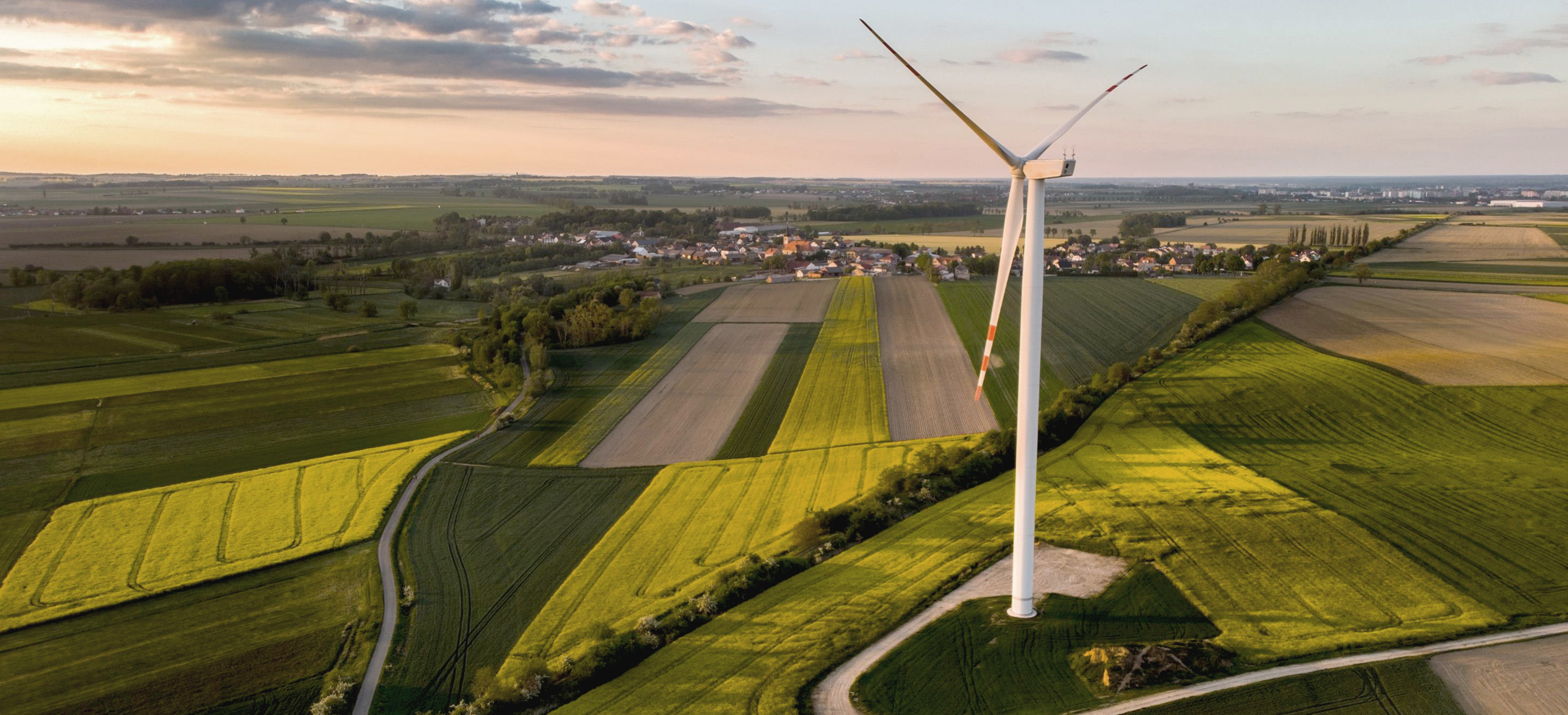 A windmill in a field.
