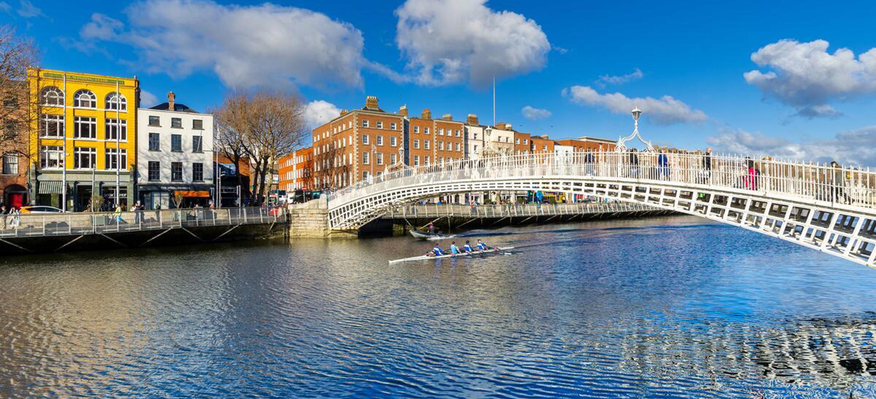 The Ha'Penny Bridge over the River Liffey in Dublin